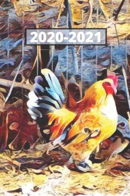 Cover of Pretty Blue Tail Golden Rooster Chicken Lover's Dated Weekly 2 year Calendar Planner