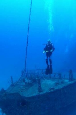 Cover of Diver at Bow of Shipwreck in Utila Journal