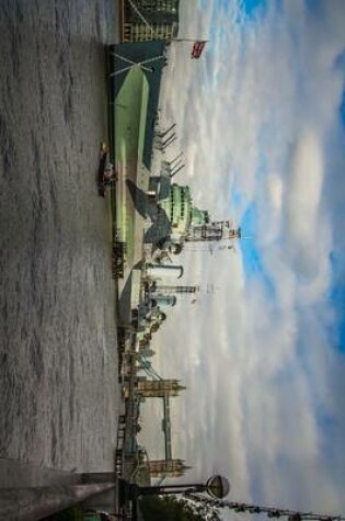 Cover of A British Warship on the Thames River in London, England