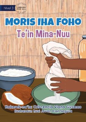 Book cover for Living in the Village - Making Coconut Oil - Moris Iha Foho - Te'in Mina Nuu