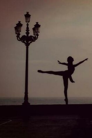 Cover of Ballet Dancer in Silhouette on a Pier Near the Ocean Journal