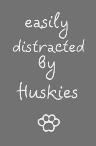 Cover of Easily distracted by Huskies