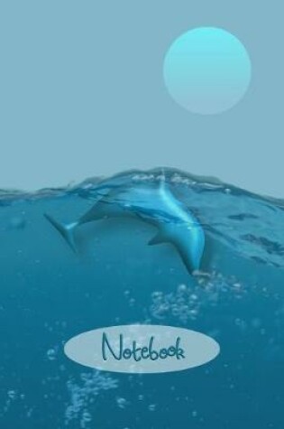 Cover of Dolphins Playing in Clear Water Notebook