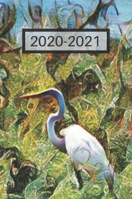Book cover for Pretty White Heron Great Egret by Lake Water Foul Bird Lover's Dated Weekly 2 year Calendar Planner
