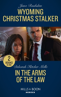 Book cover for Wyoming Christmas Stalker / In The Arms Of The Law