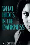 Book cover for What Hides in the Darkness