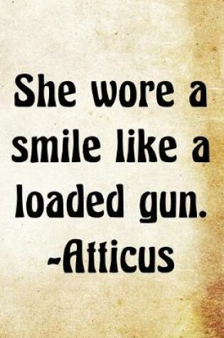 Cover of She wore a smile like a loaded gun. -Atticus