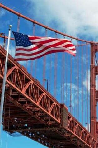 Cover of An American Flag in Front of the Golden Gate Bridge in San Francisco