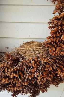 Cover of Journal Bird's Nest Pinecone Wreath