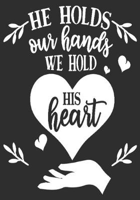 Book cover for He holds our hands We hold his heart