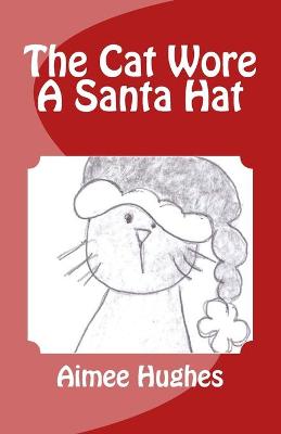Book cover for The Cat Wore A Santa Hat