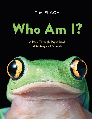 Book cover for Who Am I?: A Peek-Through-Pages Book of Endangered Animals