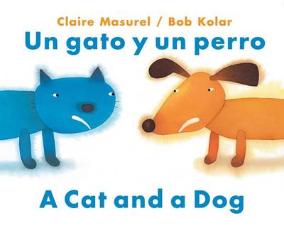 Book cover for Un Gato y Un Perro = a Cat and a Dog