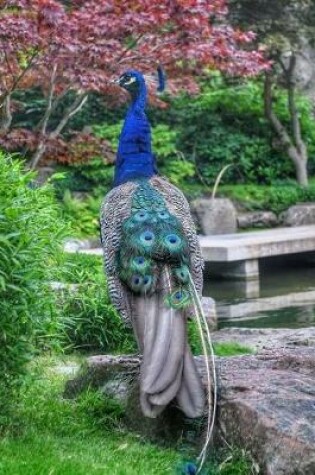 Cover of Majestic Peacock in the Garden Notebook