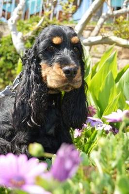 Book cover for Black and Tan Cocker Spaniel in the Garden Journal