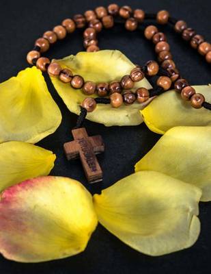 Book cover for Jumbo Oversized Rosary Beads Surrounded by Rose Petals