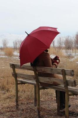 Book cover for Sitting on a Bench with a Red Umbrella on a Rainy Day Journal