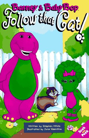 Book cover for Barney and Baby Bop Follow That Cat!
