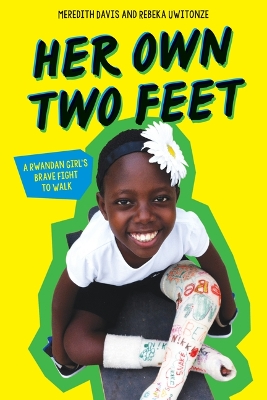 Book cover for Her Own Two Feet: A Rwandan Girl's Brave Fight to Walk (Scholastic Focus)