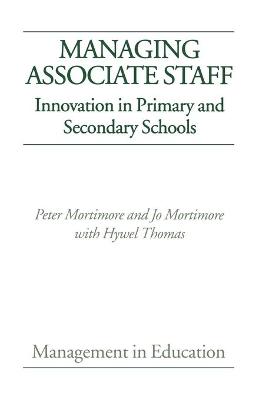 Book cover for Managing Associate Staff