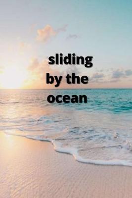 Book cover for sliding by the ocean