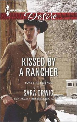 Cover of Kissed by a Rancher