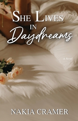 Book cover for She Lives in Daydreams