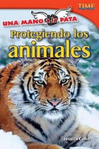 Cover of Una mano a la pata: Protegiendo los animales (Hand to Paw: Protecting Animals) (Spanish Version)