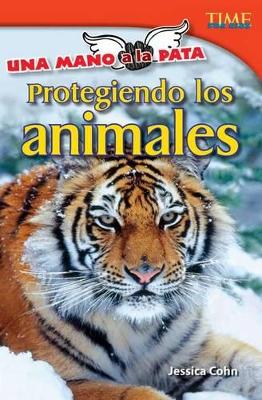Cover of Una mano a la pata: Protegiendo los animales (Hand to Paw: Protecting Animals) (Spanish Version)