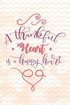 Book cover for A thankful heart is a happy heart
