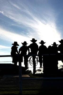 Book cover for A Silhouette of Cowboys and Cowgirls Around a Fence Journal