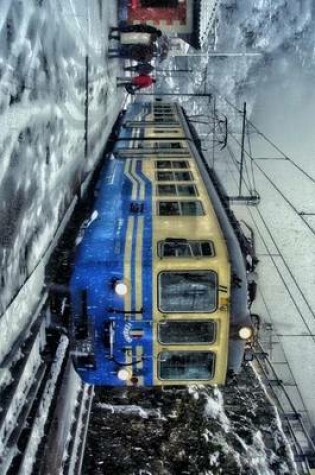 Cover of Blue and Yellow Trolley Train in the Snow