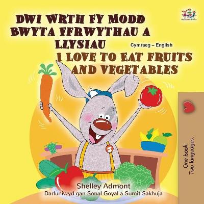 Book cover for I Love to Eat Fruits and Vegetables (Welsh English Bilingual Children's Book)