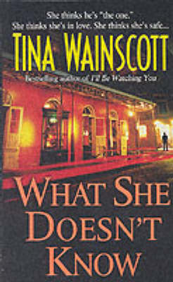 Book cover for What She Doesn't Know