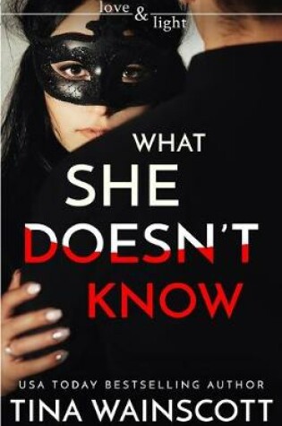 Cover of What She Doesn't Know