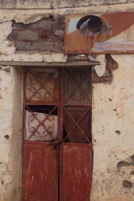 Book cover for Iron Door of an Abandoned Building