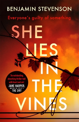 Book cover for She Lies in the Vines