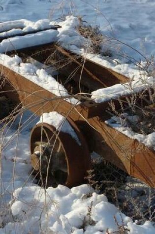 Cover of An Old Rusted Mine Cart Covered in Snow