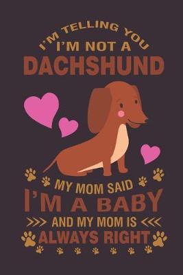 Book cover for I'm telling you I'm not a dachshund...Mom said I'm a baby