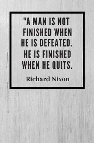 Cover of "A man is not finished when he is defeated. He is finished when he quits"