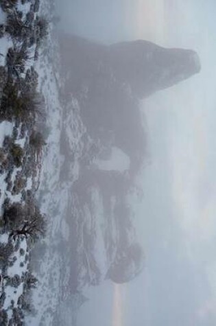 Cover of A Foggy Snow Covered View of the Turret Arch in Arches National Park, Utah