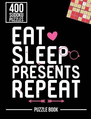 Book cover for Eat Sleep Presents Repeat Merry Christmas Sudoku Holiday Puzzle Book