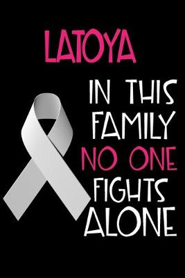Book cover for LATOYA In This Family No One Fights Alone