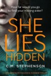 Book cover for She Lies Hidden