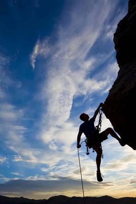 Book cover for Rock Climbing Hanging from the Rock at Sunset