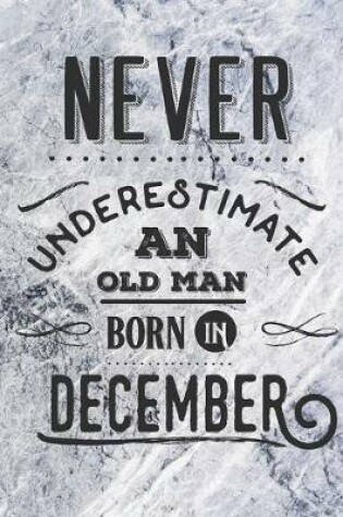 Cover of Never Underestimate an Old Man Born in December