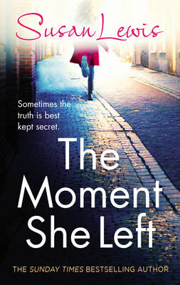 Book cover for The Moment She Left