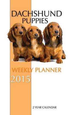 Book cover for Dachshund Puppies Weekly Planner 2015