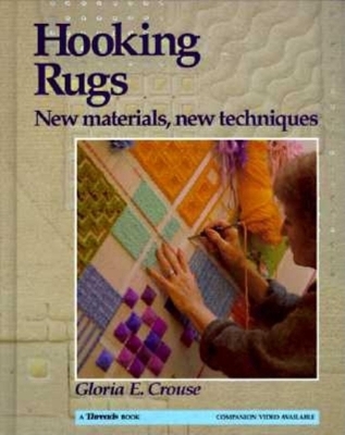 Book cover for Hooking Rugs