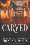 Book cover for Carved
